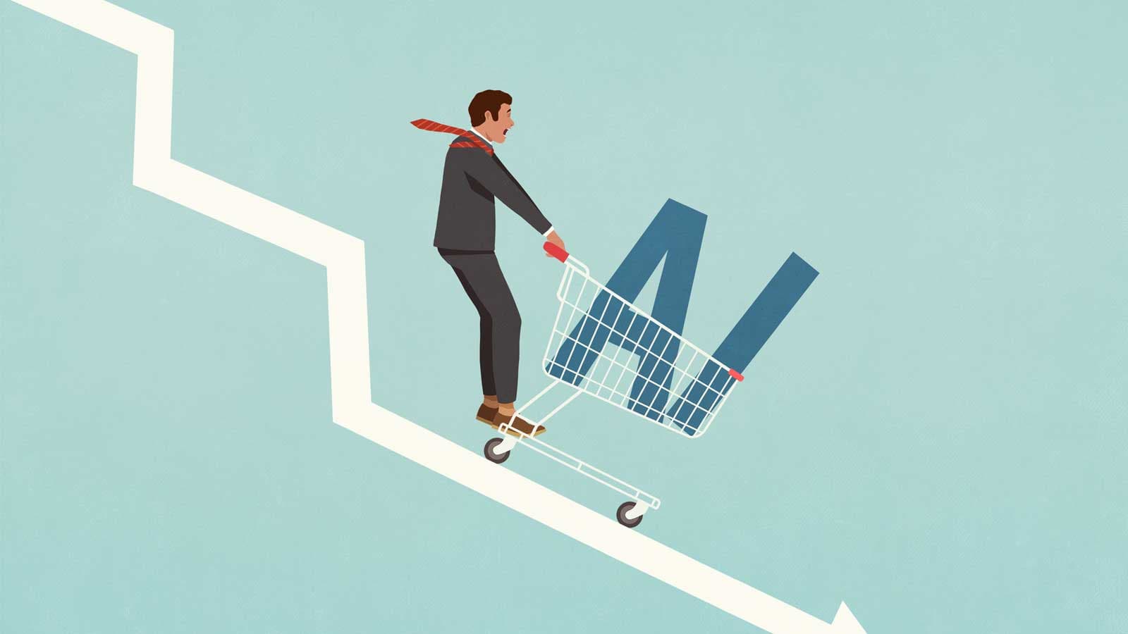Man riding a shopping trolley down a line.