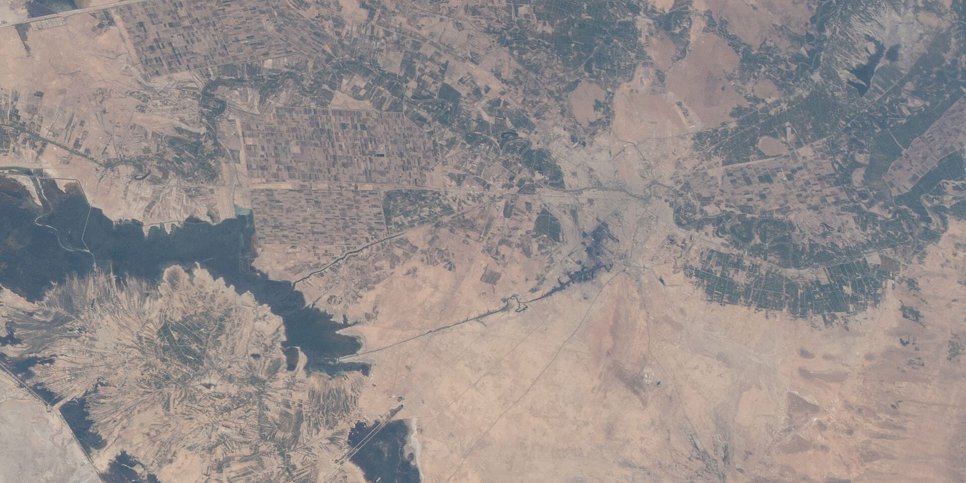 NASA ISS satellite view of Khuzestan province, Iran, showing the Karun River near Ahvaz — Darkhovin nuclear power plant lies seventy kilometres south of Ahvaz on the same river
