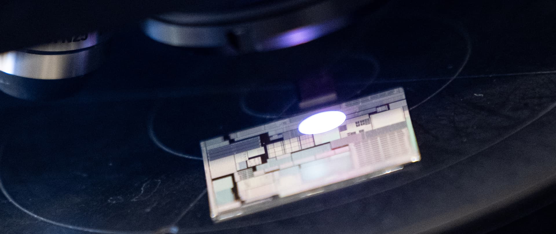 A chip under a scanner at the Center for Heterogeneous and Performance Scaling laboratory