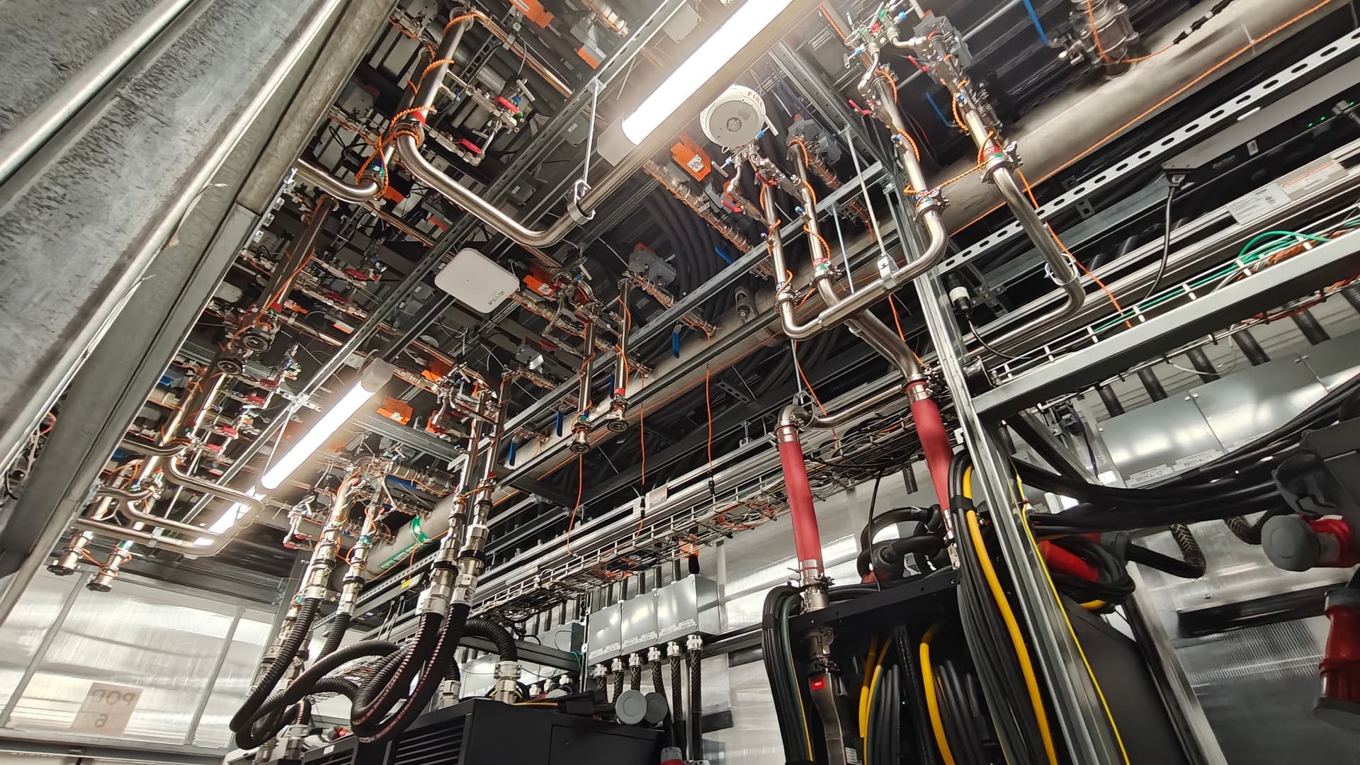 A shot of the cooling infrastructure around the NVL72 Vera Rubin setup