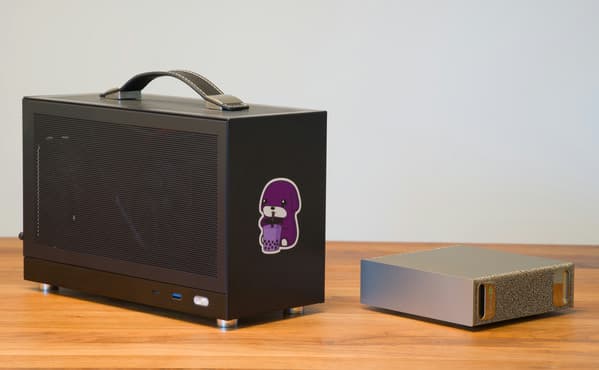 My small form factor PC next to the DGX Spark.
